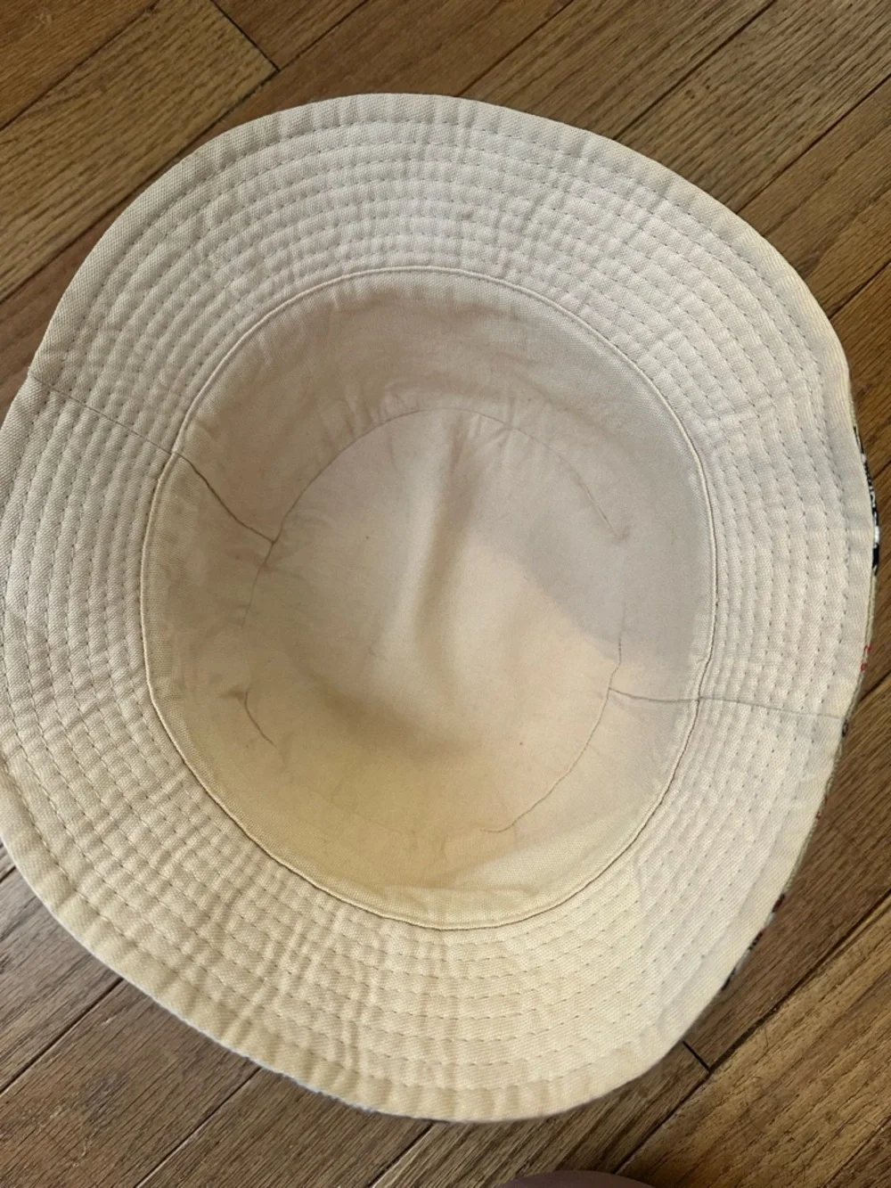 Burberry Beige Plaid Bucket Hat with Black & Red Accents